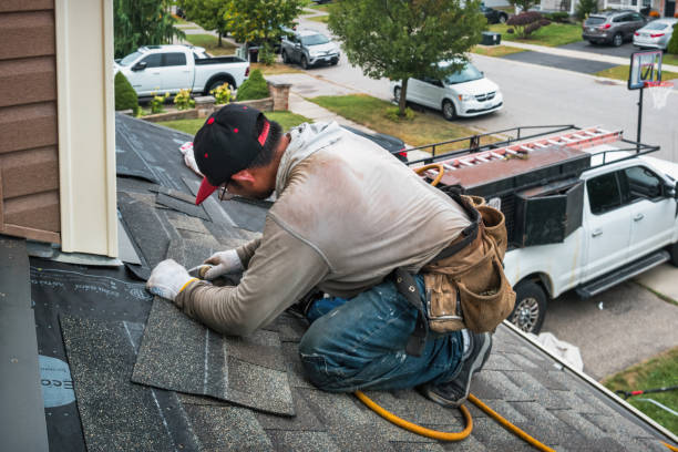 Professional Gutter Installation technician working in Falls Church, VA